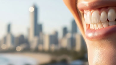Close-up of a radiant, natural-looking smile with perfect white teeth, implying a full mouth dental restoration. The background is a highly blurred, bright Australian city skyline or coastal scene.