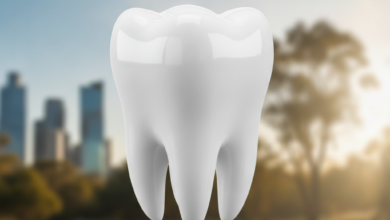 Close-up of a perfectly healthy, white molar tooth, sharp and clean, with a softly blurred, sunny Australian cityscape or natural landscape in the background, symbolizing dental care and location.