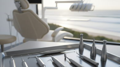 Close-up photorealistic image of sterile, precision dental implant tools arranged on a metallic tray in a modern, clean dental operatory. The tools are in sharp focus. In the very softly blurred background, a sunny Australian coastal landscape with distant waves is visible through a large window. The image has cinematic lighting and no text.