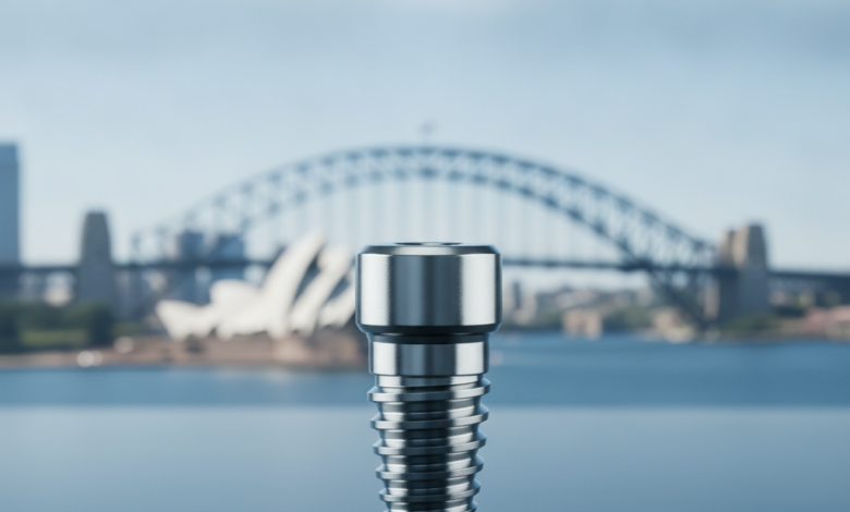 A close-up, photorealistic view of a gleaming titanium dental implant, intricately detailed, set against a softly blurred background featuring the iconic Sydney Opera House and Harbour Bridge under a clear sky.