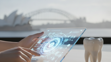 A close-up of hands reviewing abstract financial information next to a clean dental model, with a blurred Australian city skyline in the background, symbolizing dental financing.