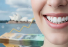 A close-up of a healthy, bright smile with a clean, soft focus. In the background, blurred financial concepts like abstract currency or a graph subtly blend with a distant, iconic Australian landmark, such as the Sydney Opera House, all rendered with a shallow depth of field. The image symbolizes dental health, financial considerations, and the Australian context.