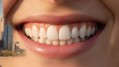 Close-up of a bright, healthy, and confident smile with perfectly aligned teeth, featuring a blurred background of the iconic Melbourne city skyline, symbolizing cosmetic dental services and smile enhancement in Melbourne.